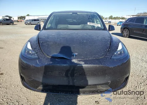 2024 Tesla Model Y from USA, damaged, VIN 7SAYGDED4RF017614